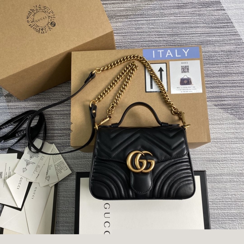 G*u*i top handle bags
